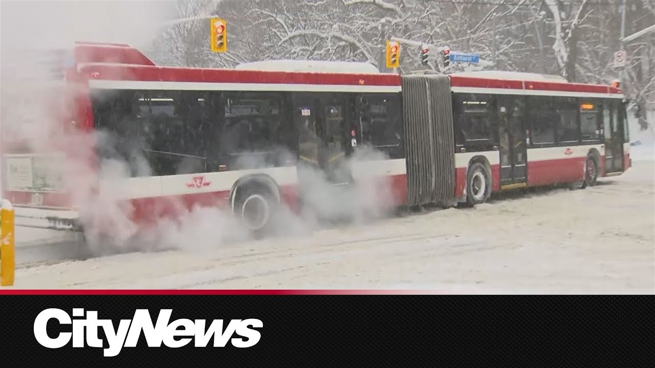 TTC bus struggles to make left-turn on icy uphill