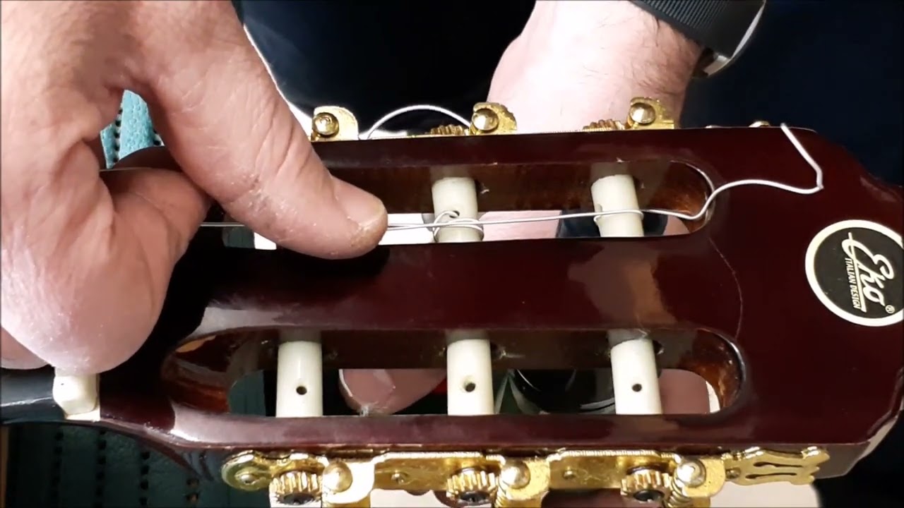 Pillole di liuteria 2 HD - il montaggio delle corde sulla chitarra classica