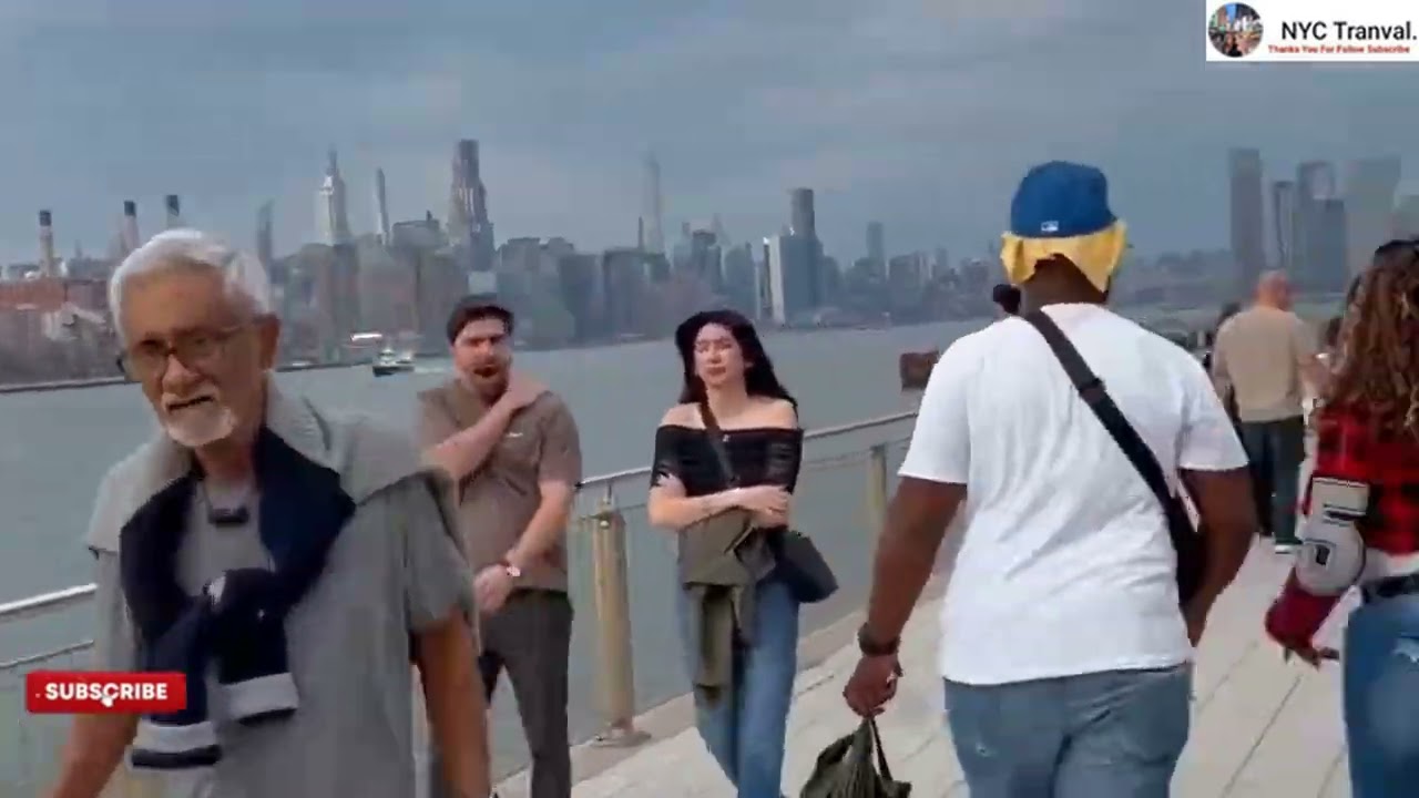 New Yorkers are out and about today! It's 80° in New York City! Take a walk with me in Domino Park,