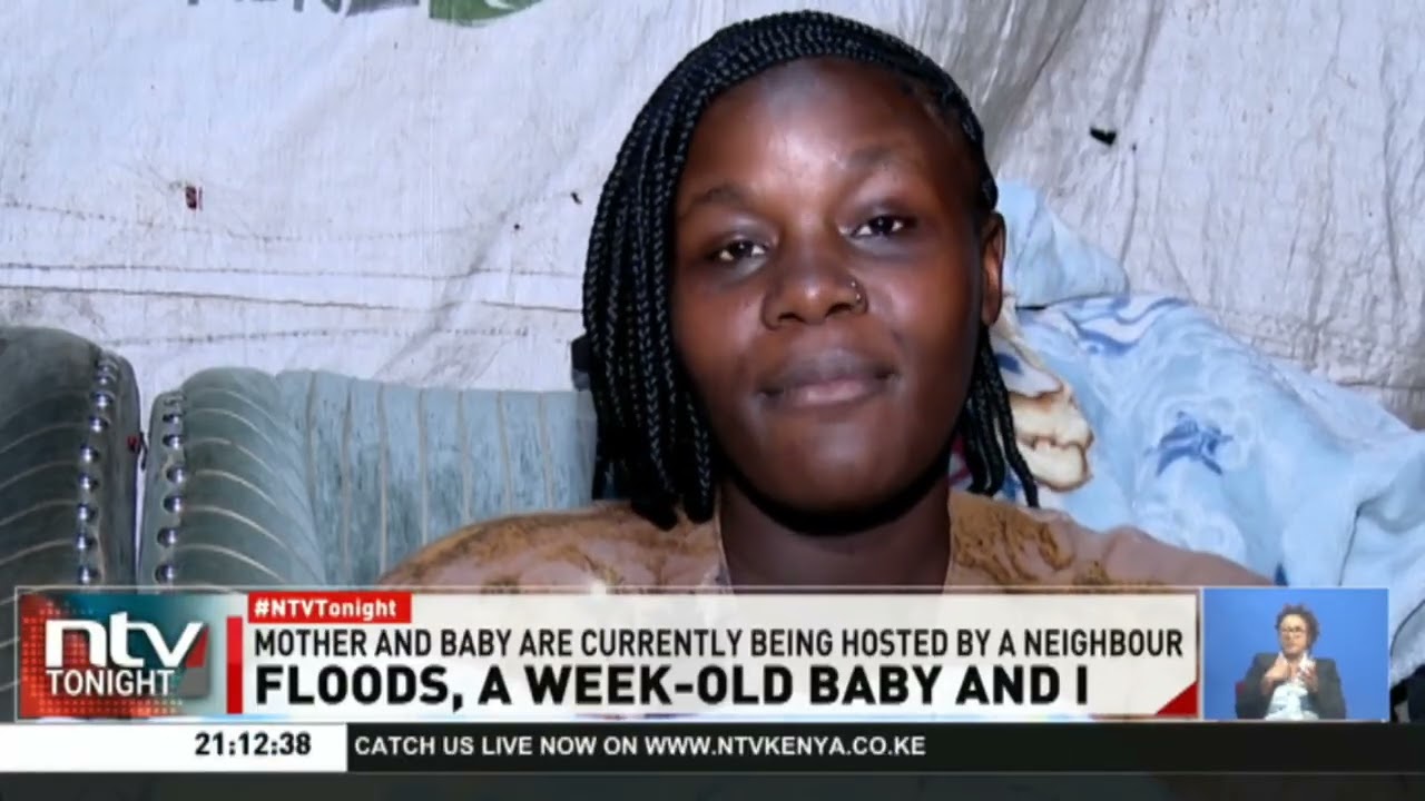 Young mother and her one-week-old baby stay in club after flood waters submerged their house