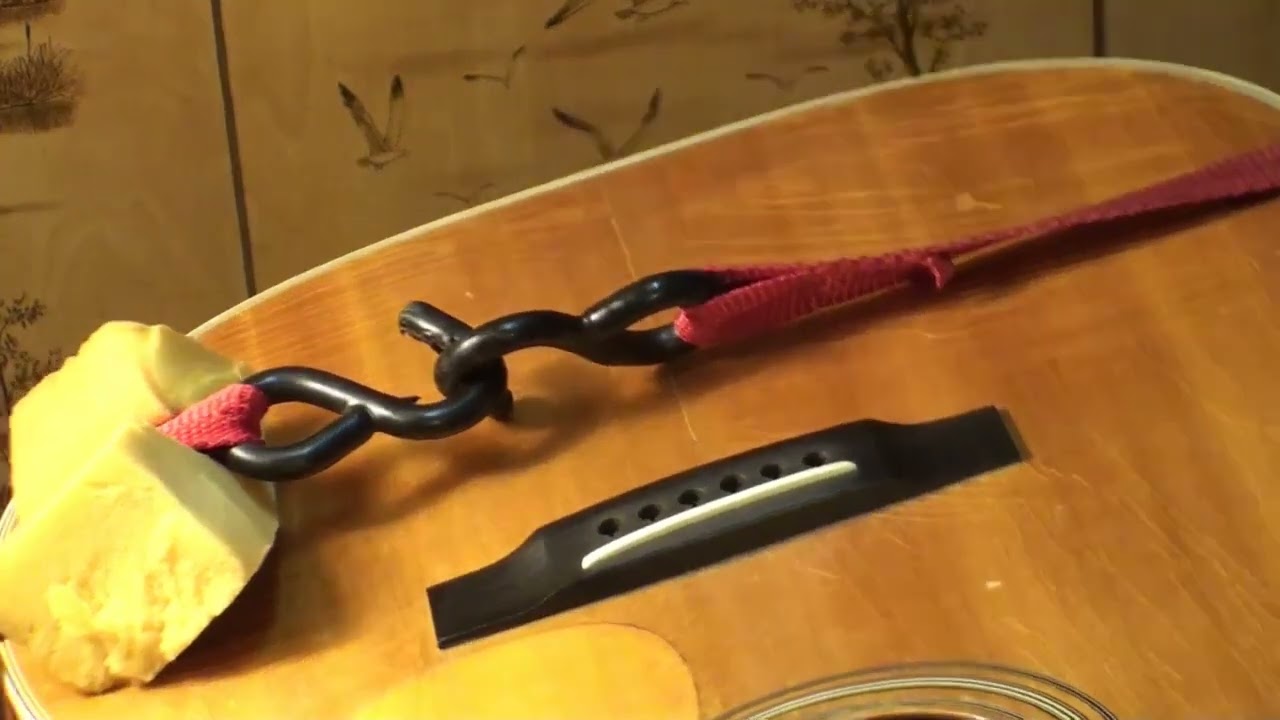 Acoustic guitar cracked top / seam separation repair by Randy Schartiger