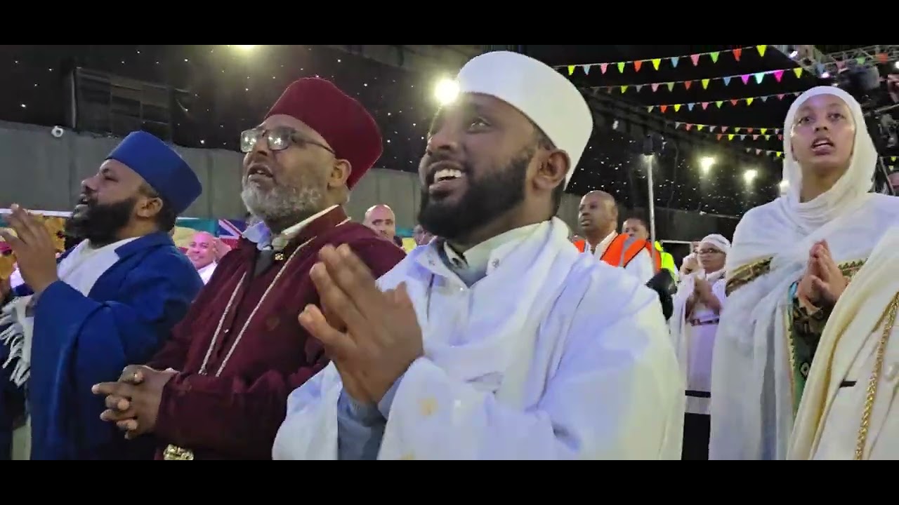 በ UK ሸፊልድ ደብረ ምህረት ቅዱስ ሚካኤል በዓለ ጥምቀት አዘጋጅነት የተደረገ  ሊቀ መዘምራን ቀሲስ ምንዳዬ ብርሃኑ በዝማሬ 