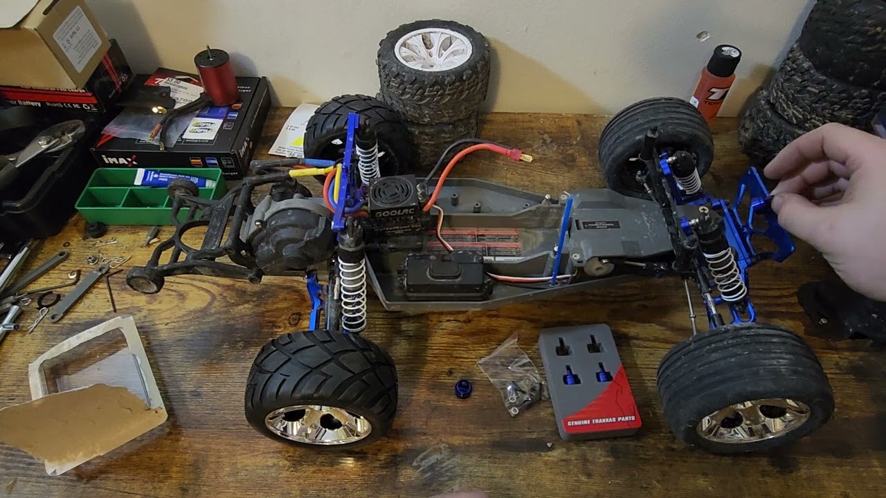 Traxxas Rustler: Jato tires and aluminum shock caps