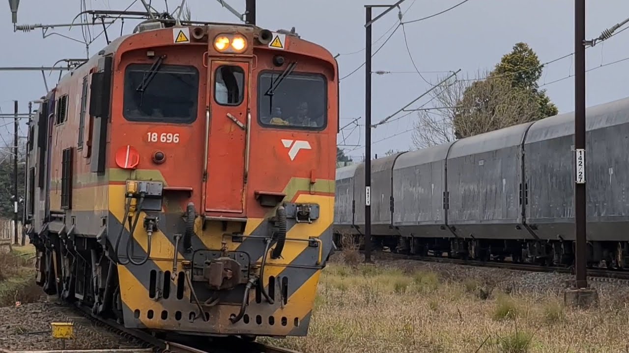 South African Railways class 18E locomotives at Lions River station. Track clearance.