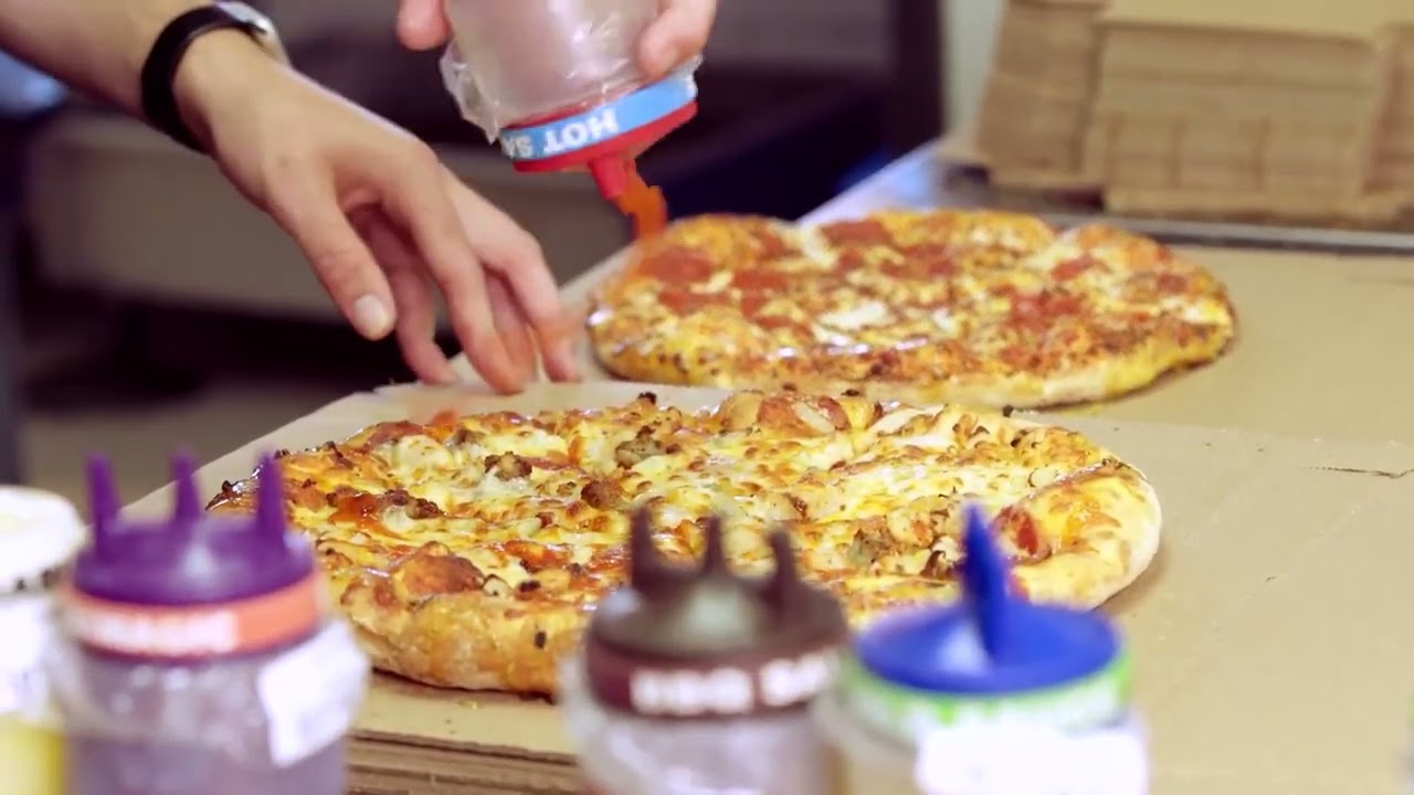 Domino's Pizza US sales dip as economic uncertainty hurts demand | REUTERS