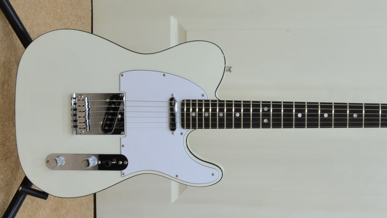 Fender Telecaster American Ultra в цвете &laquo;Жемчужно-белый&raquo;.
