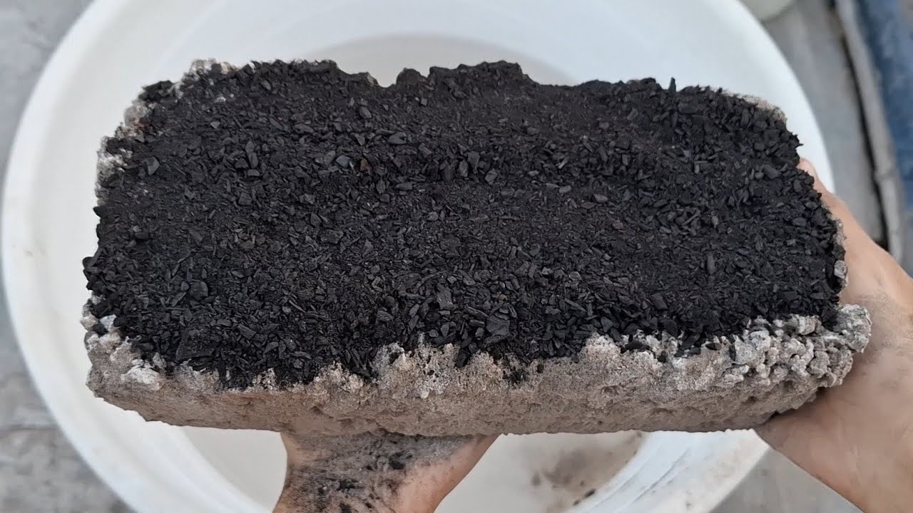 New video Charcoal gritty shapes crumbling in water satisfying