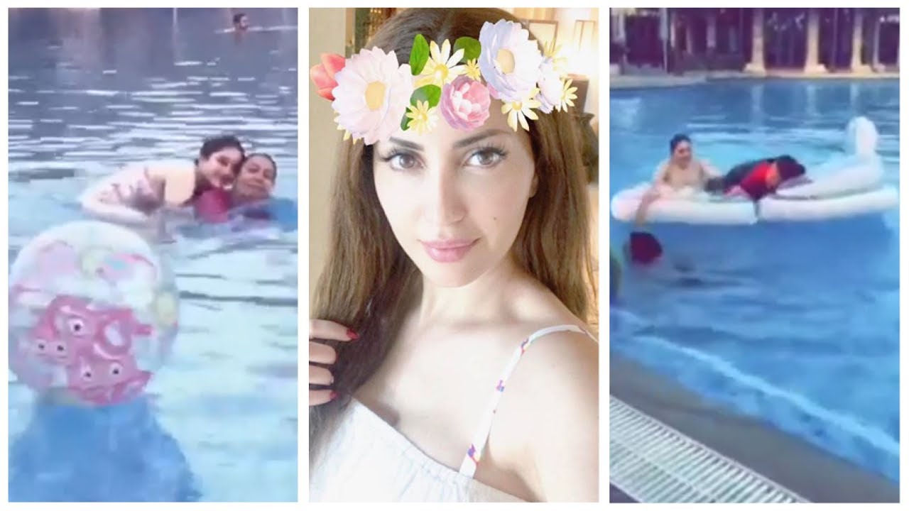 نسرين طافش مع خواتها واطفالهم يسبحون في مسبح مختلط !! شاهد