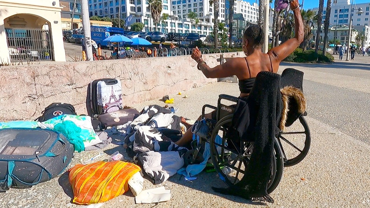 Paramedics try to Help Unstable Homeless Woman on Santa Monica Beach