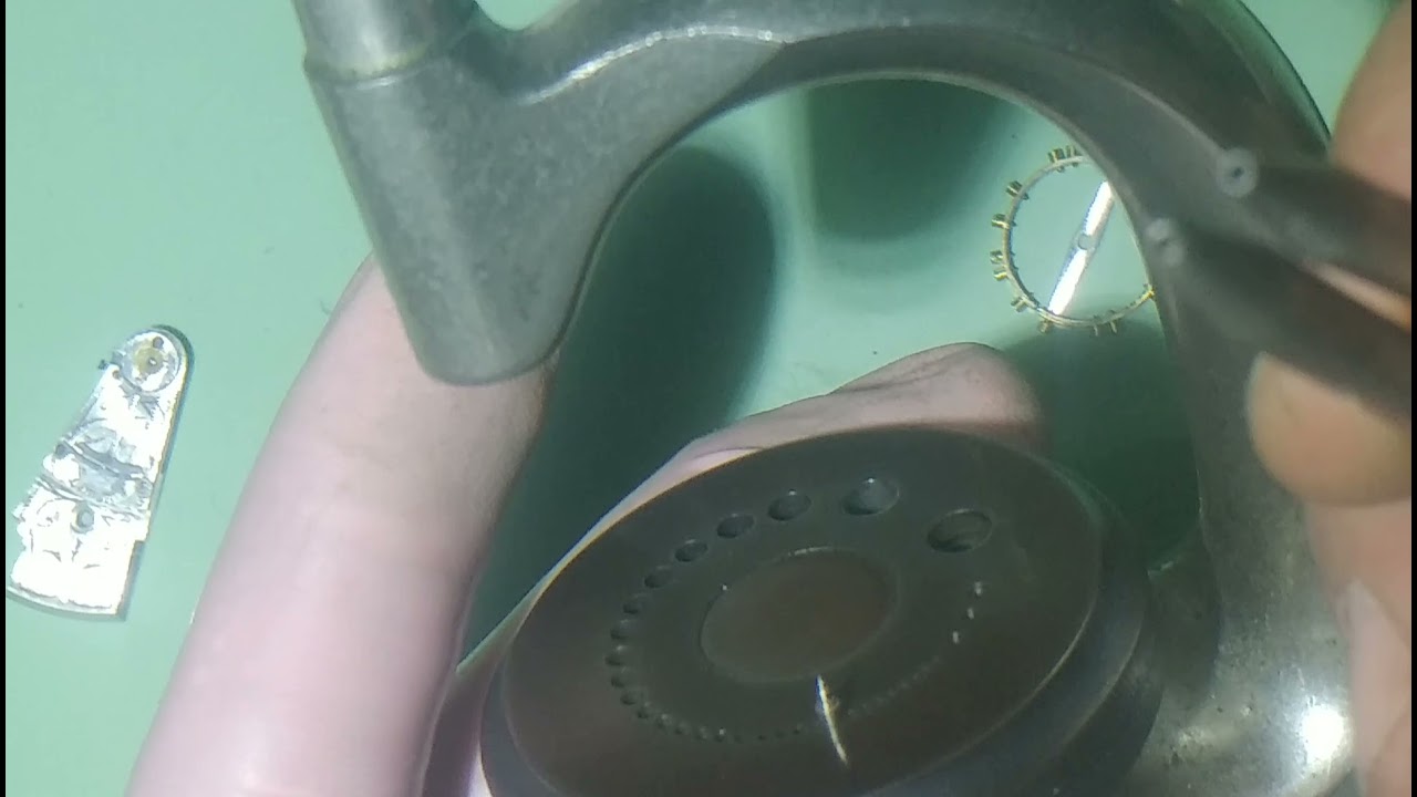 como cambiar el eje de volante de un reloj mecánico
