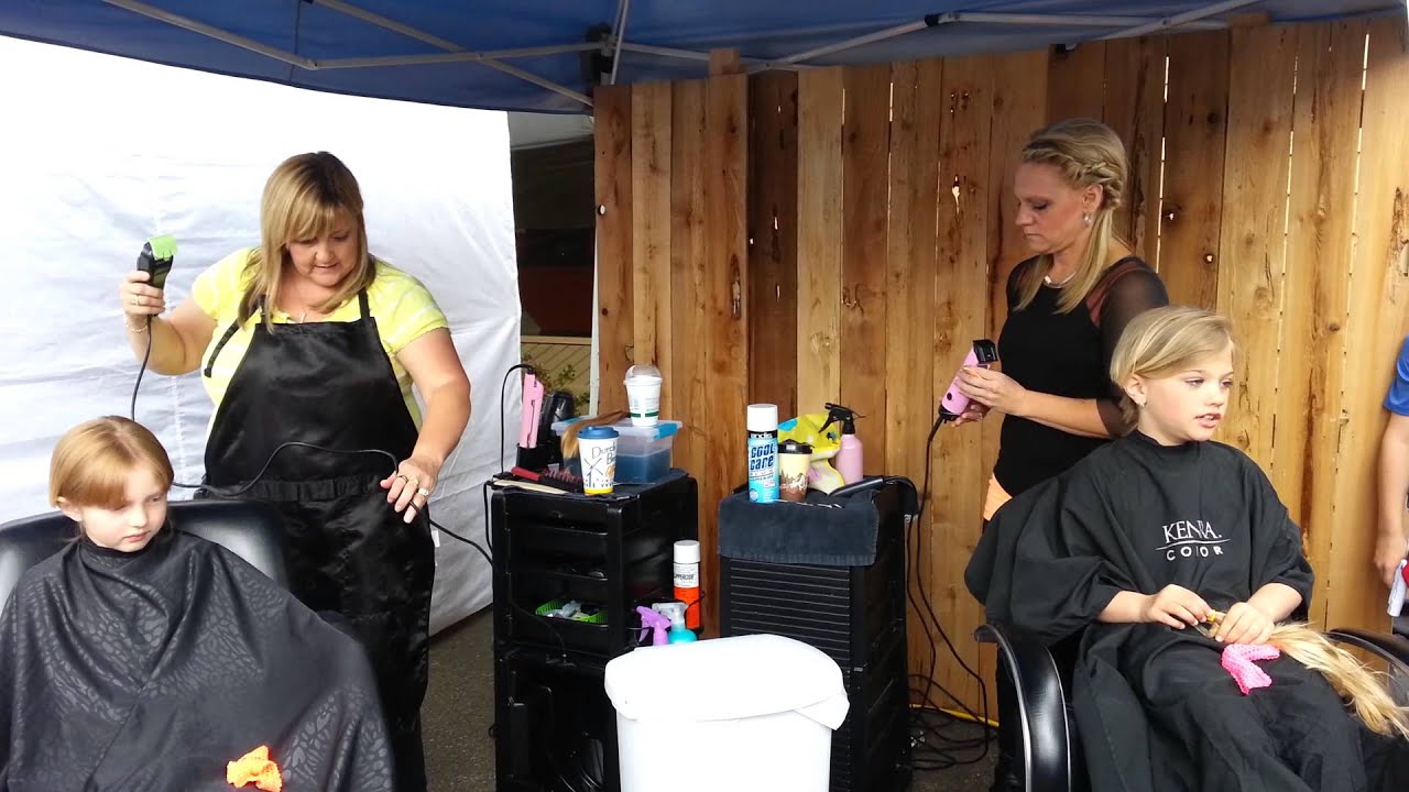 Emma shaves for wigs for kids