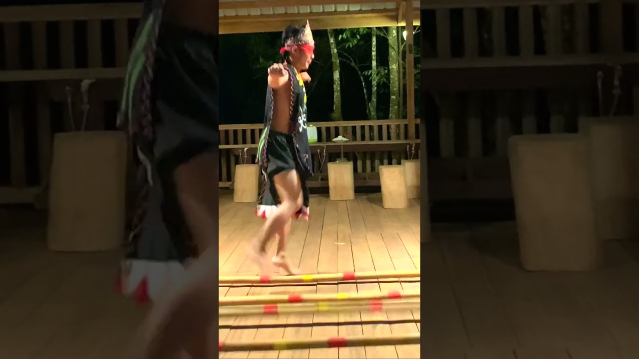 Blindfolded bamboo dance