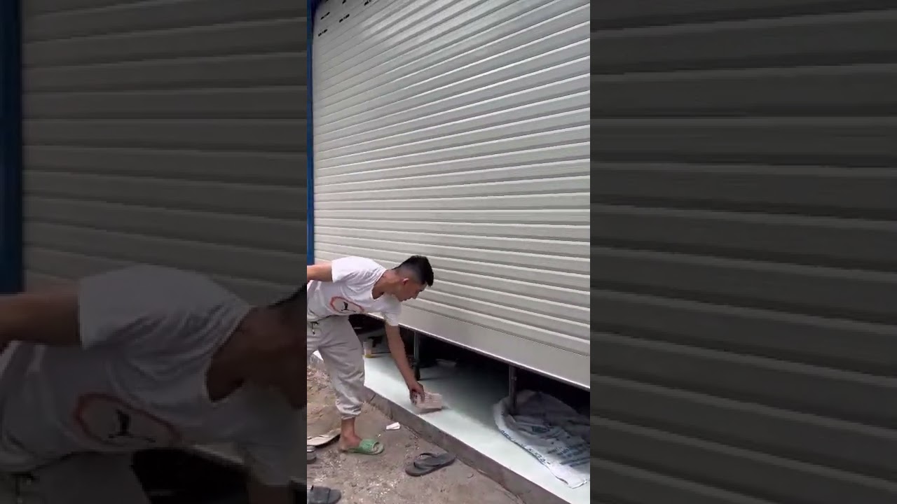 Cửa cuốn tấm liền nhôm Austdoor AL68