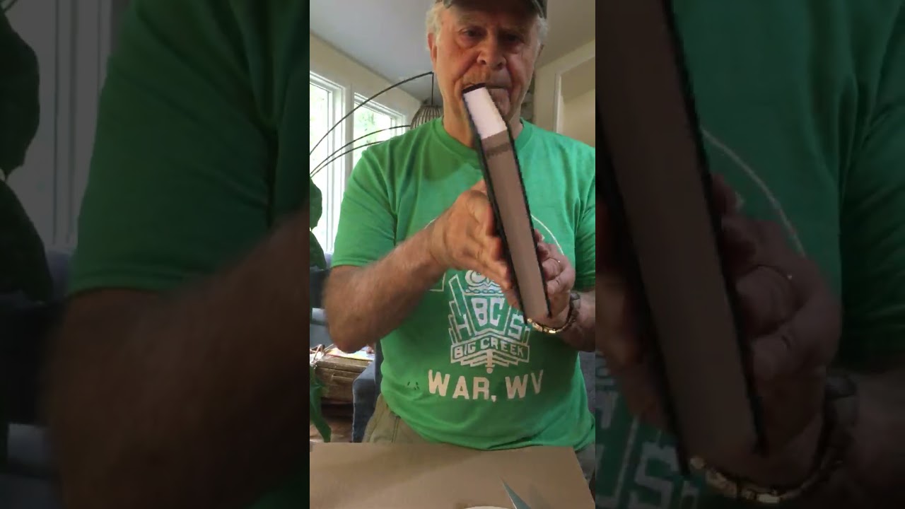 Homer Hickam receives his new memoir Don't Blow Yourself Up at his wife's bookstore