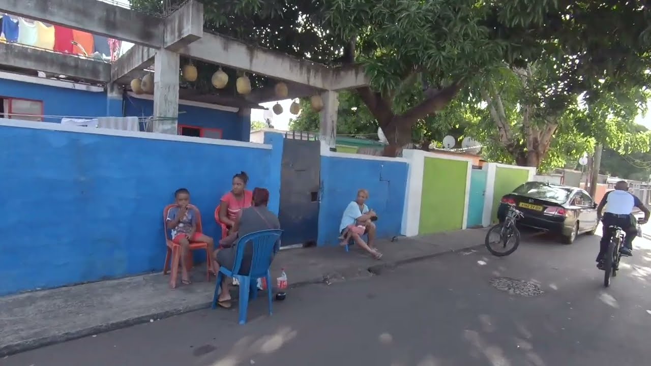 walking beautiful colorful city life (roche bois). nice people mauritius POV