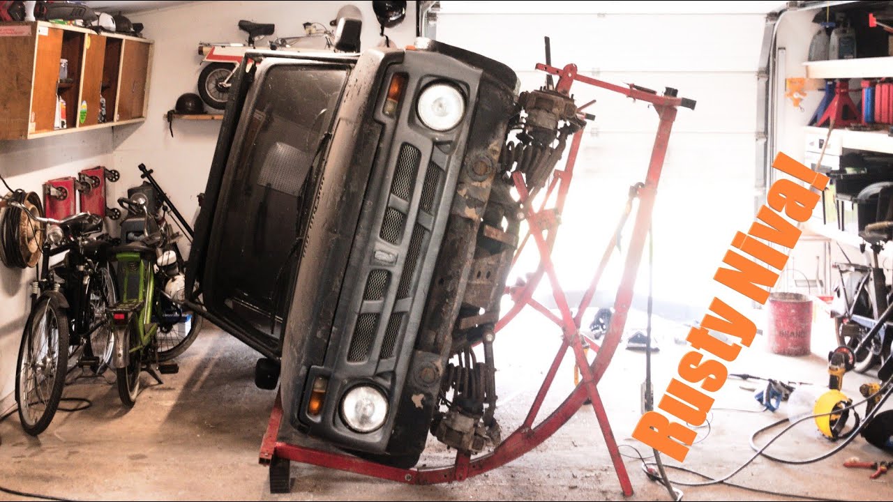 The Lada Niva is flipped onto its side... and its time melt some metal!