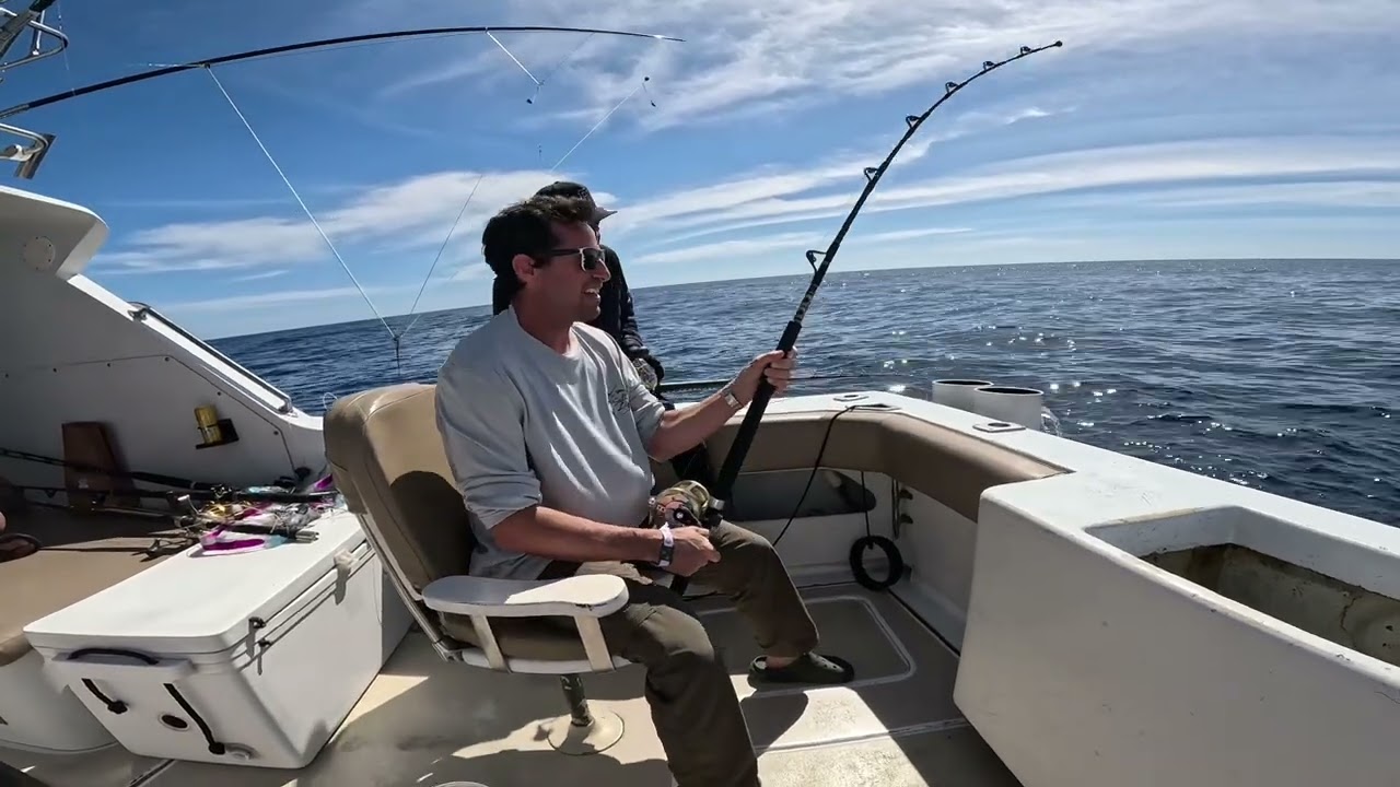 Brian bringing in his marlin 