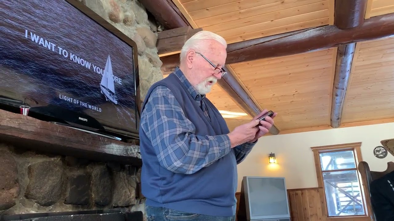 Aarno serves communion at men's outing March 2023