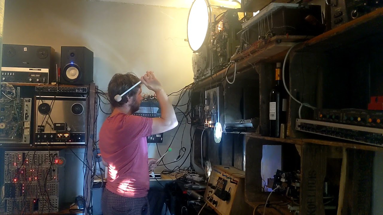 Tape machines (reverse, start/stop), some signal delays and pings/oscillators reacting to a drum