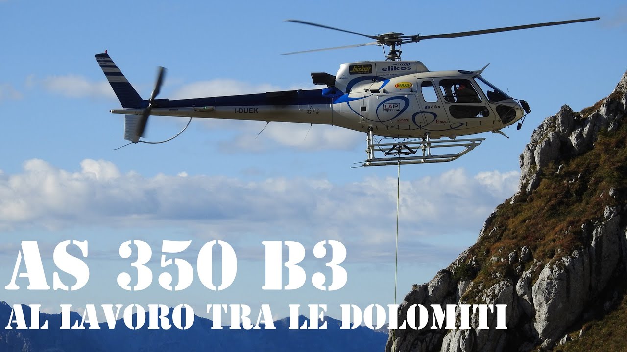 Un AS 350 B3 di Elikos al Passo Fedaia e tra le Dolomiti