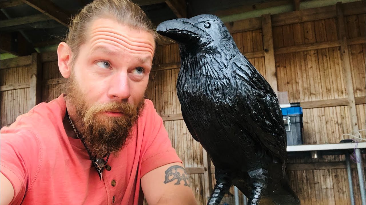 Arts and crafts fair. Carving an old crone and a raven!
