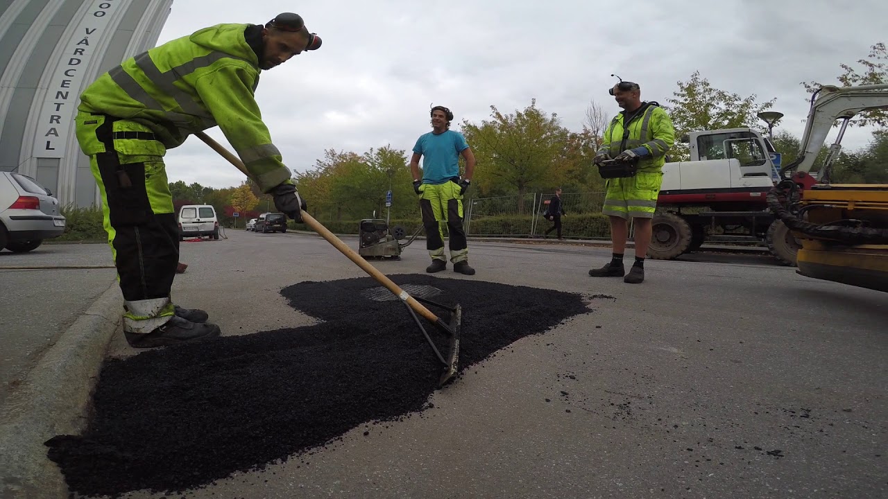 asfaltering med sprider