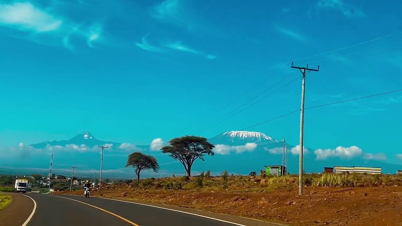 Kimana Emali Oloitokitok road highway Amboseli National Park Mount Kilimanjaro Scenic Landscape View