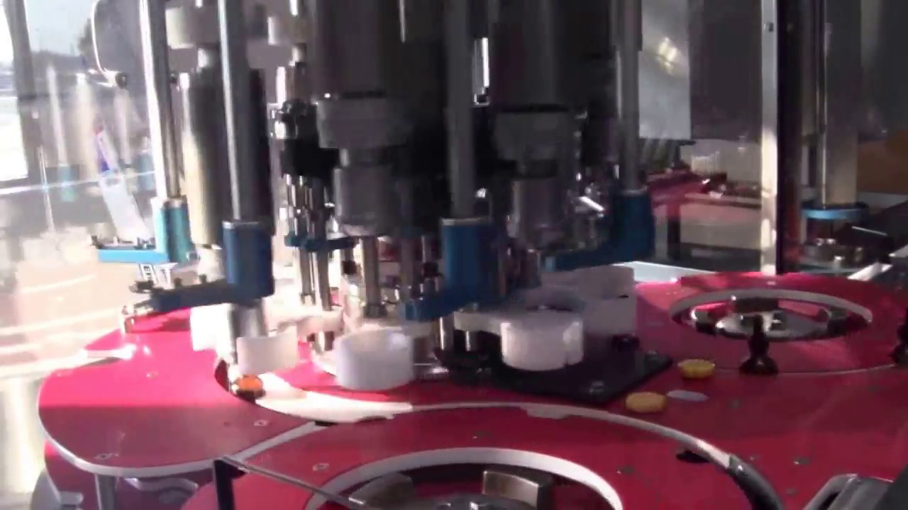 DTM Packaging Purefil 2000 High Speed Liquid Filling Line