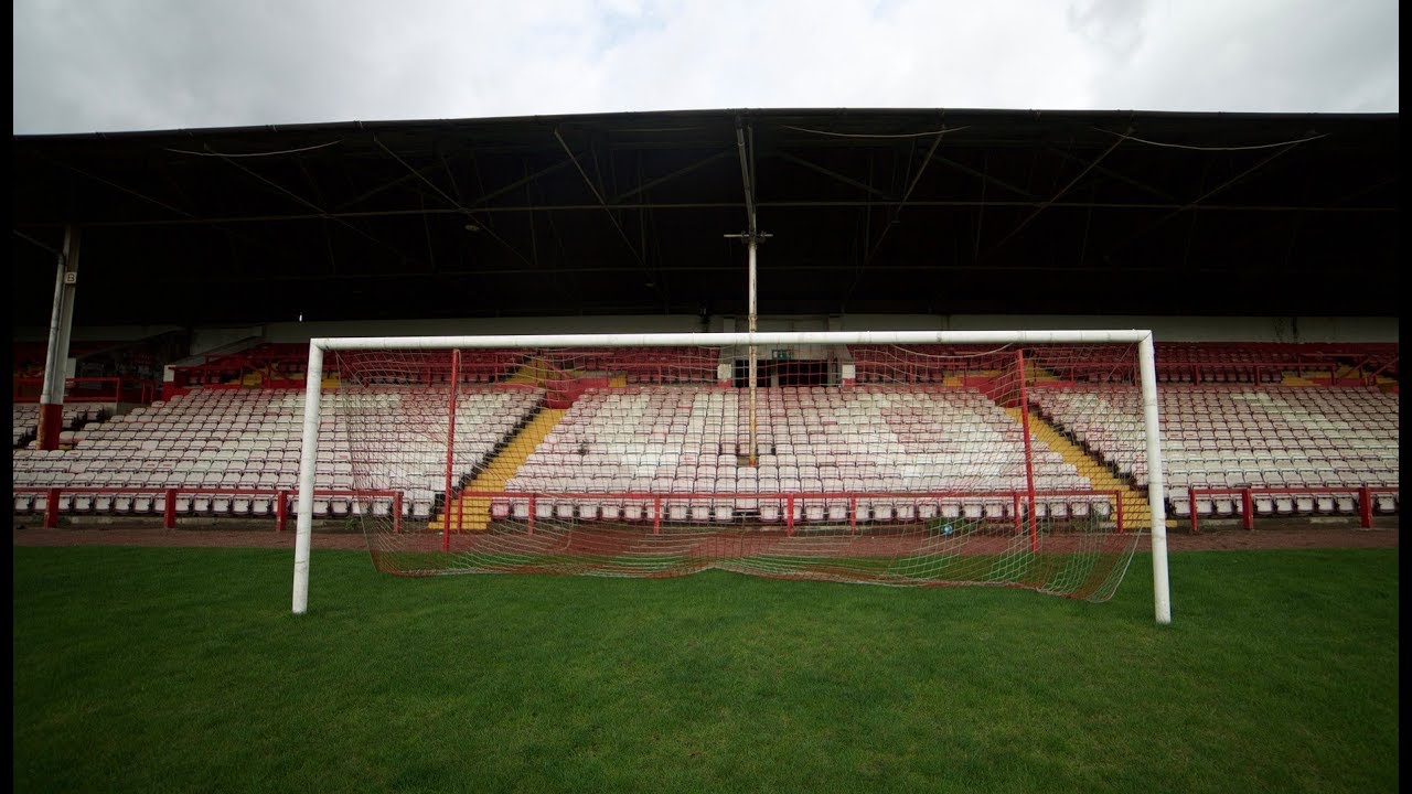 SNEAKING INTO AN ABANDONED FOOTBALL STADIUM!!!