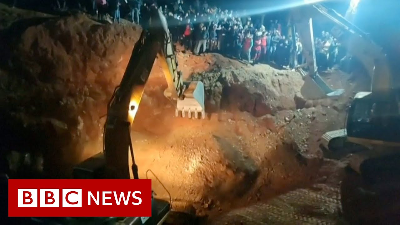 Rescuers work to rescue five-year-old who fell down a well - BBC News