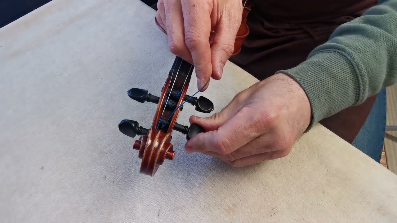 Comment changer une corde de violon?