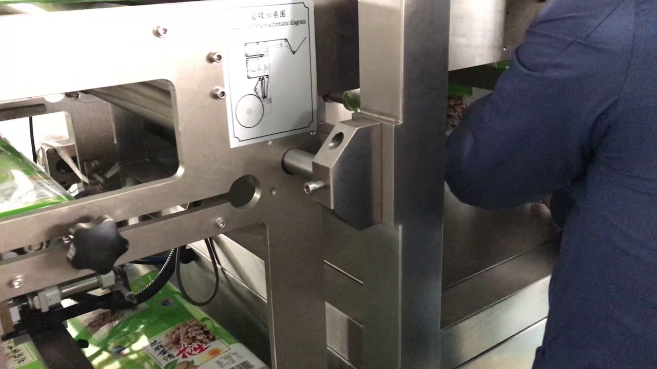 how to install the packing material on the packing machine