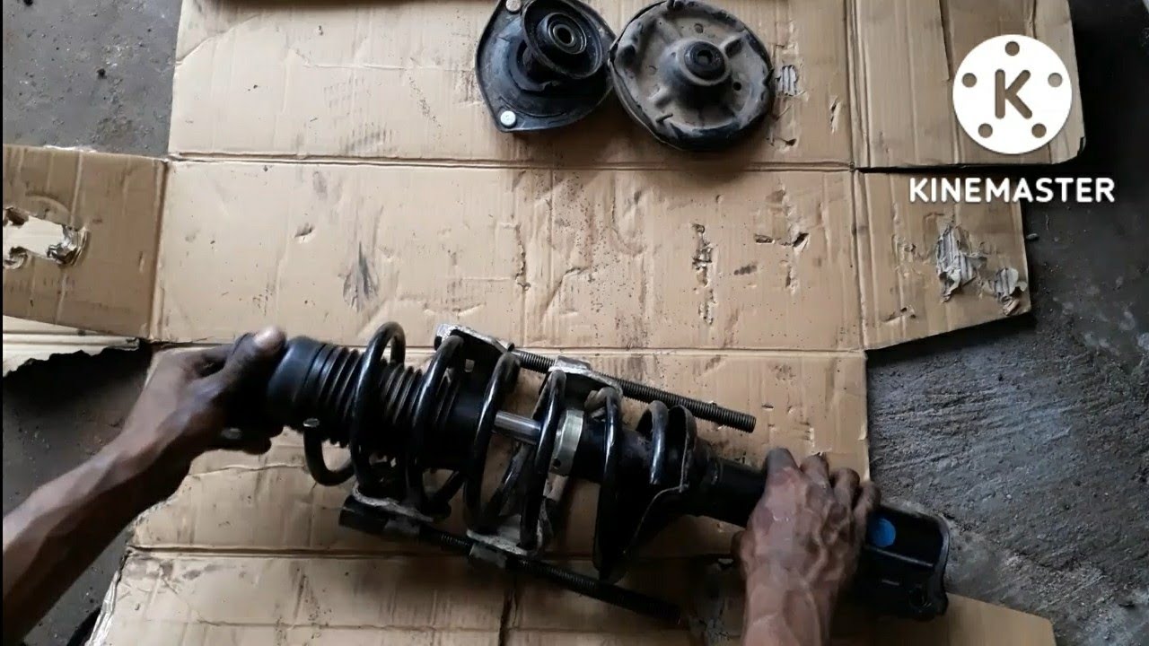 Hyundai accent front strut overhauling