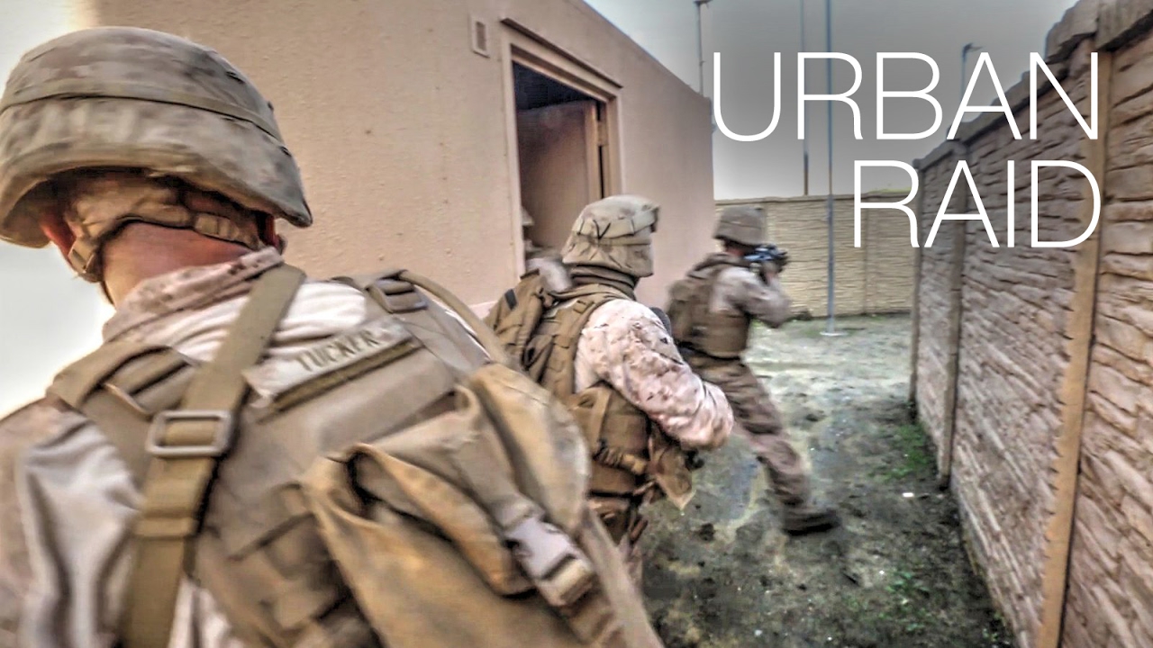U.S. Marines Conduct Raid During Urban Combat Simulation