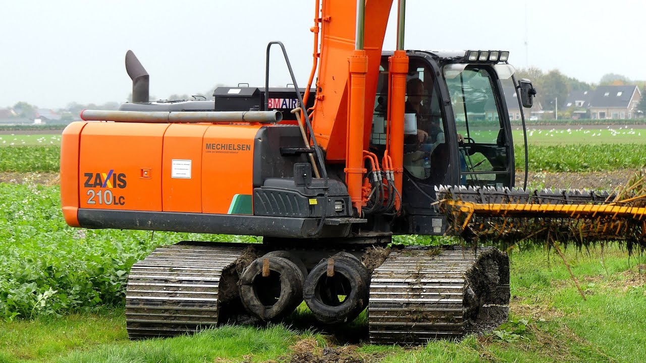 Sloten schonen met HITACHI Zaxis 210 LC Rupskraan. Mechielsen Oldenhove BV.