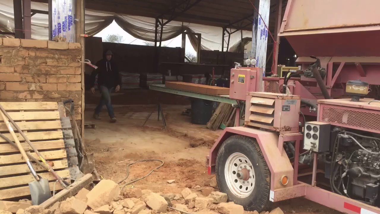 AECT 3500 compressed earth block machine producing 480 CEBs per hour!