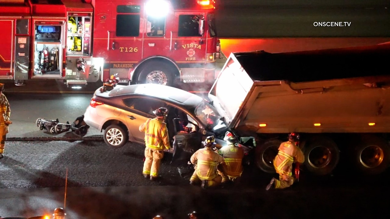Family Trapped After Crashing Under Dump Truck