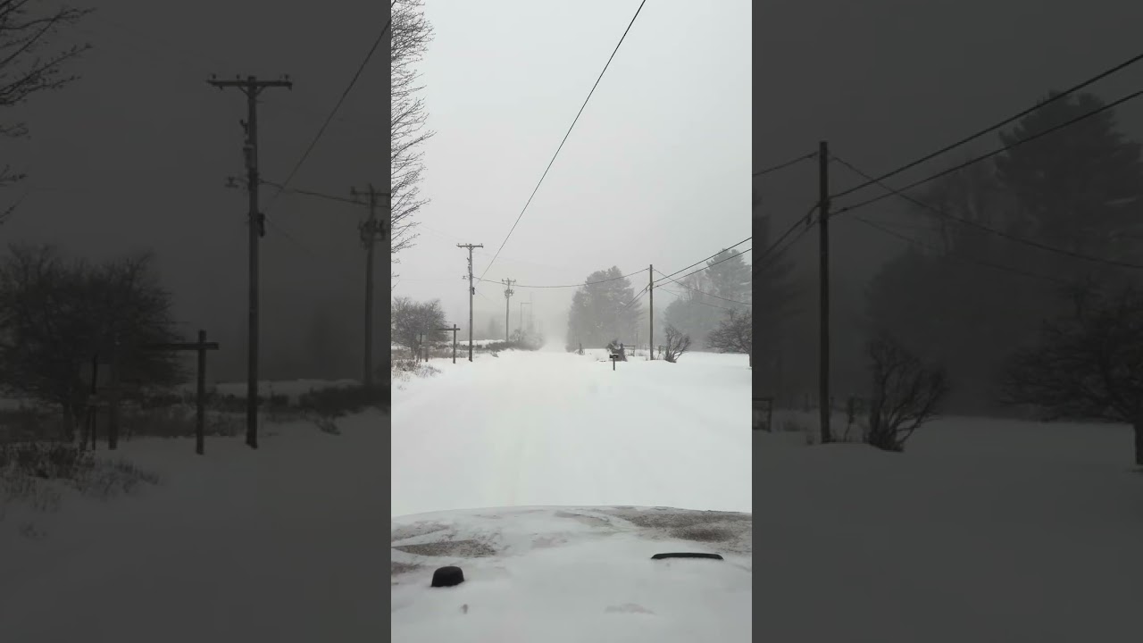 Jeep Wrangler driving in snow storm with snow covered roads! Dangerous drifting and sliding all over