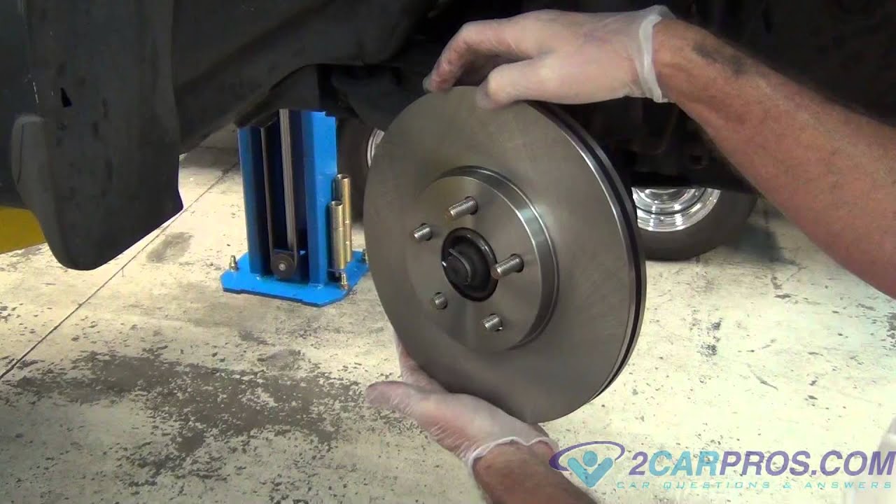 Замена передних тормозных колодок и ротора Chrysler PT Cruiser