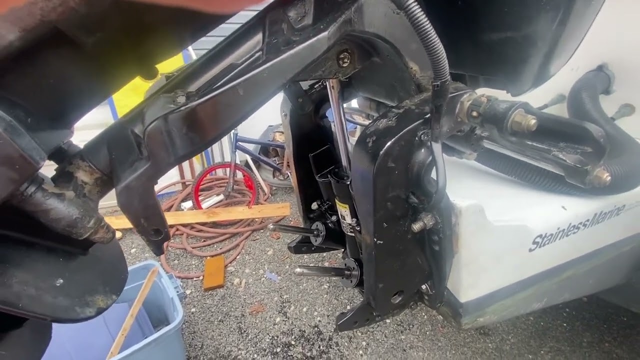 Remove Trim assembly on mercury outboard with out removing the motor