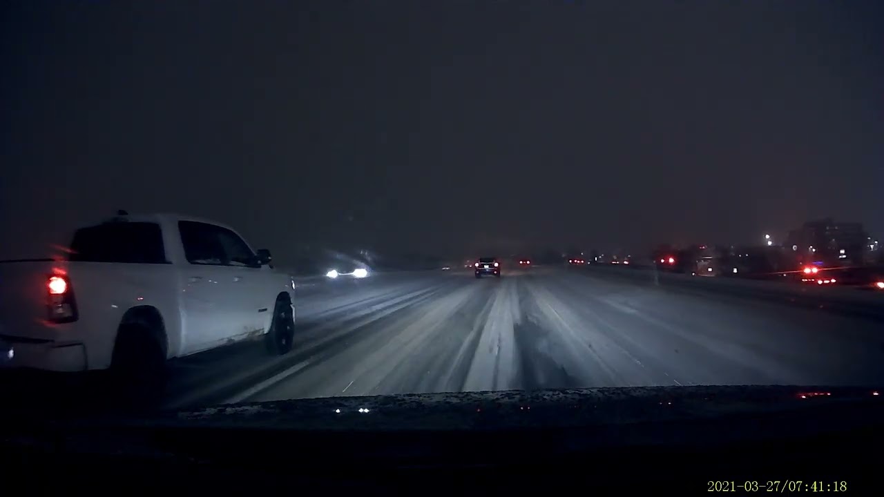 POV drive chasing headlights through the storm ❄️