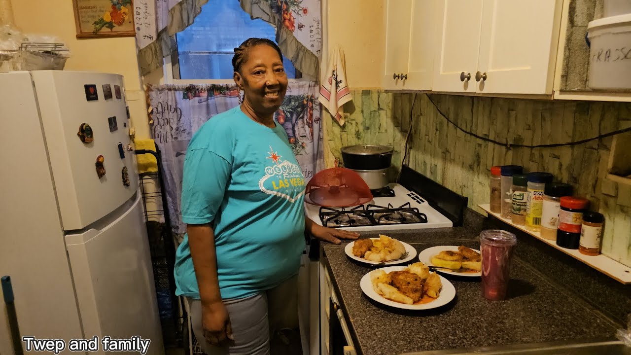 Cooking brown stew snapper fish with dumplin/banana/yam/sweet potato 