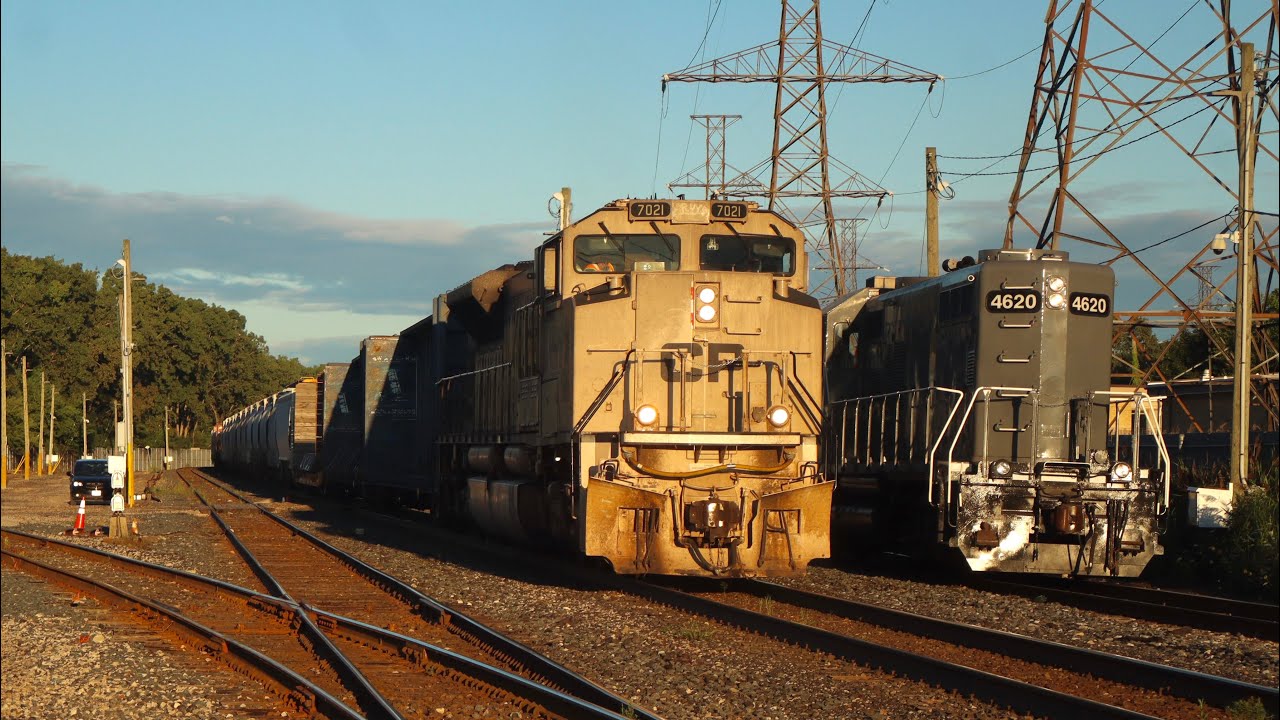 Meet! CP 7021 leads CPKC 230 meeting LDSX 4620 at Dougall in Windsor, ON.