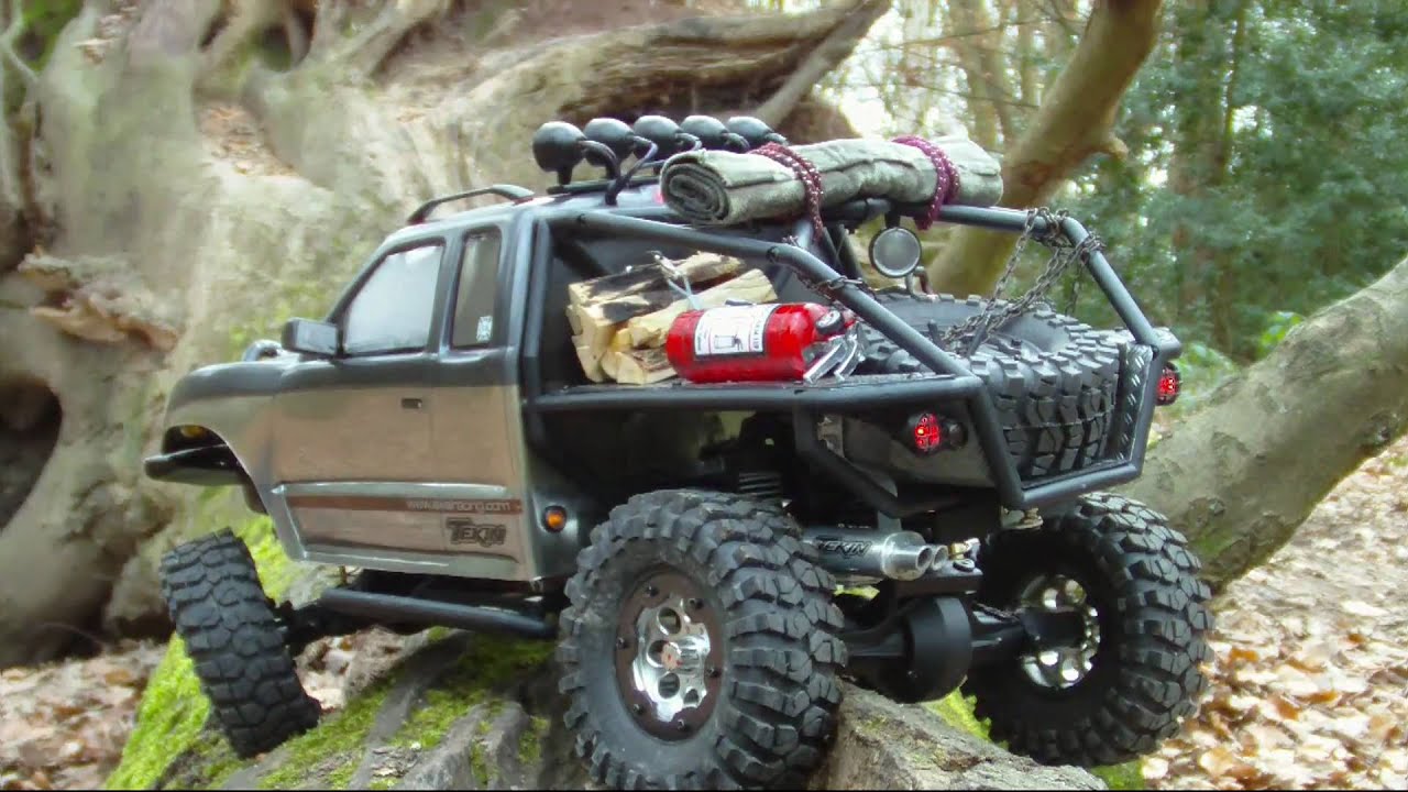 Axial Honcho trail crawling in the forest.