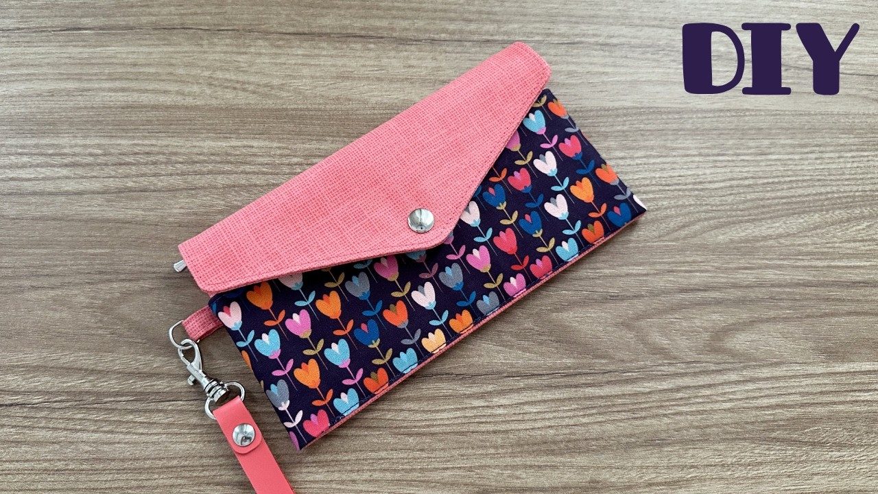 Clutch super prática | Porta celular | 3 bolsos