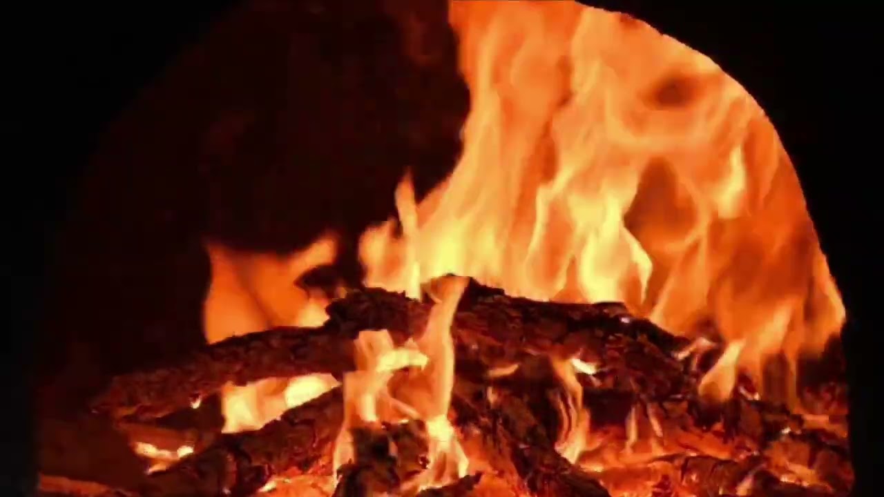 Fire in the hearth. The warmth and coziness of the fire.