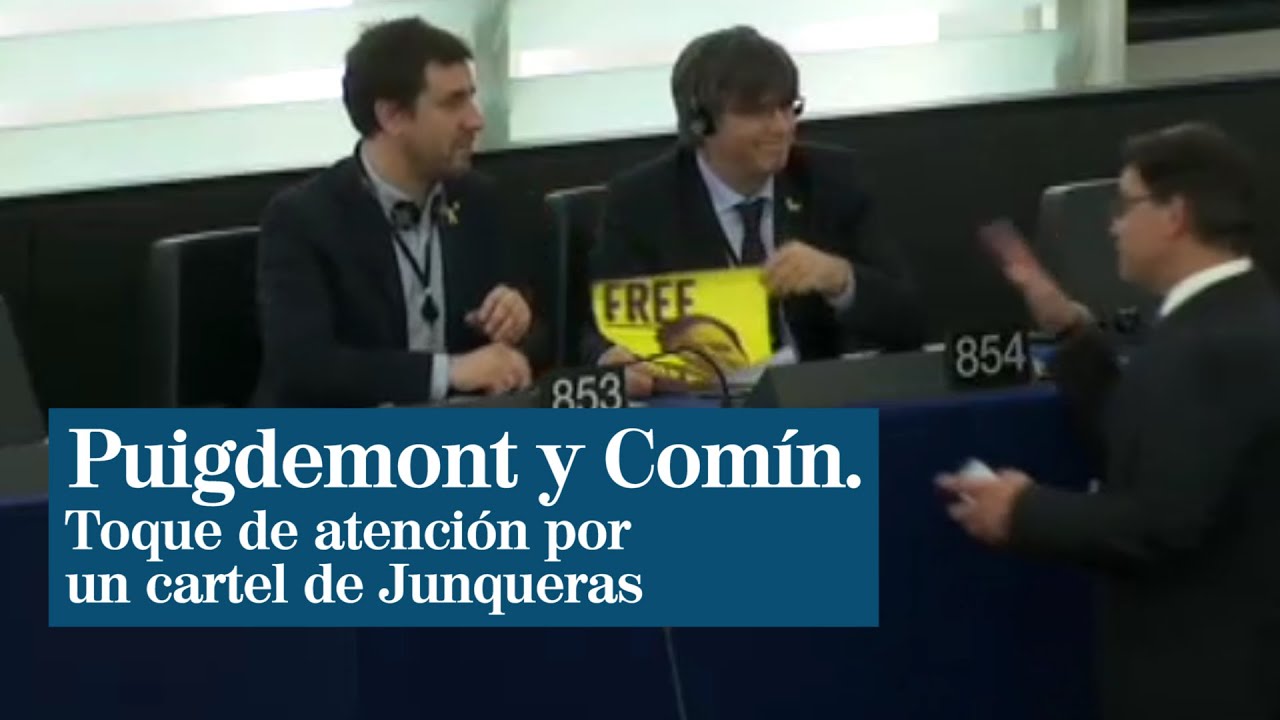 Puigdemont y Comín se estrenan como eurodiputados con una pancarta de Oriol Junqueras