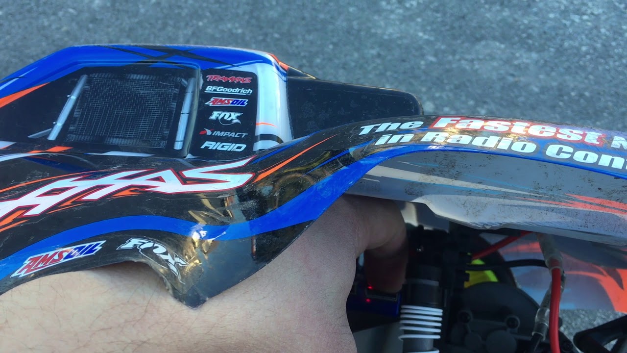 Traxxas Slash 2wd Brushed XL 5 Titan 12T vs VXL 3 Velineon on 2s drag race which is faster stock