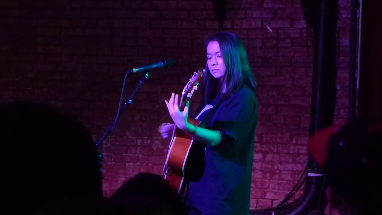 Mitski performing 