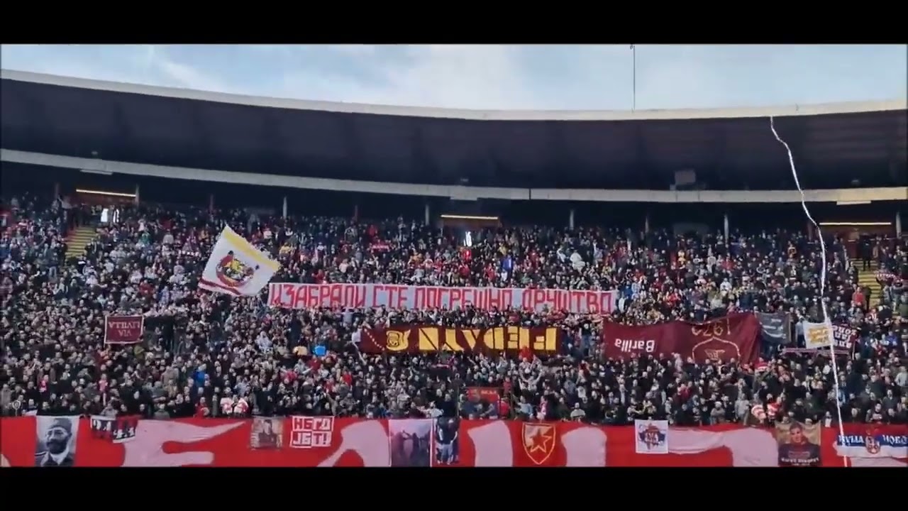 Delije burn Fedayn Roma flags during the match against Čukarički